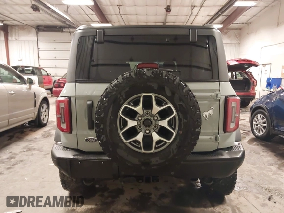 2021 Ford Bronco z VIN 1FMEE5DP0MLA64549, wystawiony jako IAAI lot #41719646 z przebiegiem 33 089 mil mil oraz . Historia ofert i sprzedaży dostępna na DreamBid. Obrazek 16.
