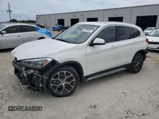 2021 BMW X1 sDrive28i z VIN WBXJG7C05M5T09284, wystawiony jako Copart lot #57589985 z przebiegiem 39 722 mil mil oraz Szkoda całkowita • Salvage title. Historia ofert i sprzedaży dostępna na DreamBid. Obrazek 1.