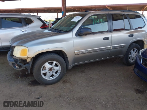 2003 GMC Envoy SLT with VIN 1GKDS13S732346641, listed as a IAAI auction lot 42111222 with 291,231 mi miles and . Bid and sale history available at DreamBid. Image 18.