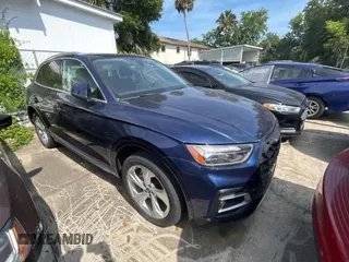 2021 Audi Q5 Premium Plus z VIN WA1BAAFY2M2128107, wystawiony jako Copart lot #62093395 z przebiegiem Nie podano mil oraz Czysty tytuł • Clean title. Historia ofert i sprzedaży dostępna na DreamBid. Obrazek 1.