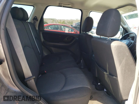 2006 Mazda Tribute S with VIN 4F2YZ04176KM19634, listed as a Copart auction lot 46796315 with 276,632 mi miles and Salvage Title. Bid and sale history available at DreamBid. Image 10.