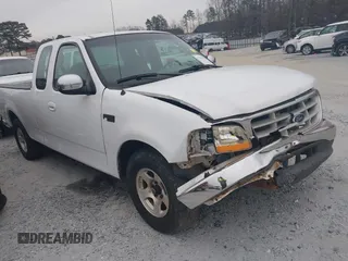 1999 Ford F-150 with VIN 1FTZX1728XNA81813, listed as a IAAI auction lot 41367154 with 149,103 mi miles and . Bid and sale history available at DreamBid. Image 1.