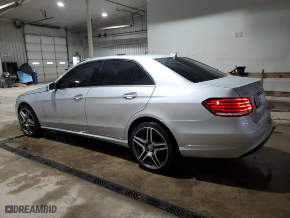 2014 Mercedes-Benz E-Class E 350 Luxury with VIN WDDHF8JB2EB029033, listed as a Copart auction lot 52008215 with 84,713 mi miles and Salvage Title. Bid and sale history available at carsss.com. Image 2.