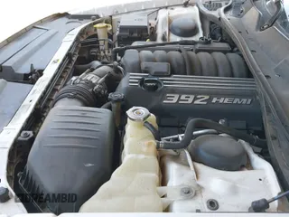 2013 Dodge Challenger SRT-8 with VIN 2C3CDYCJ1DH588064, listed as a IAAI auction lot 42283713 with 143,262 mi miles and . Bid and sale history available at DreamBid. Image 20.