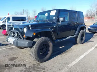 2010 Jeep Wrangler Unlimited Sahara with VIN 1J4HA5H16AL215659, listed as a IAAI auction lot 41749218 with 55,544 mi miles. Bid and sale history available at carsss.com. Image 18.