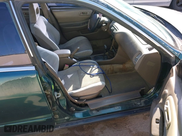 1999 Acura Integra with VIN JH4DB7660XS001176, listed as a IAAI auction lot 41851522 with 174,280 mi miles and . Bid and sale history available at DreamBid. Image 5.
