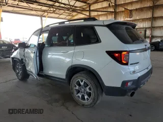 2023 Honda Passport TrailSport z VIN 5FNYF8H68PB000476, wystawiony jako Copart lot #55079045 z przebiegiem 30 543 mil mil oraz Szkody całkowita. Historia ofert i sprzedaży dostępna na DreamBid. Obrazek 2.