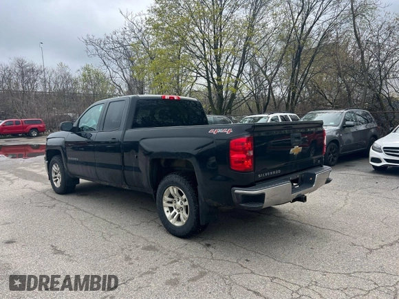 2014 Chevrolet Silverado 1500 LT with VIN 1GCVKREH1EZ169899, listed as a IAAI auction lot 42143501 with 124,789 mi miles and . Bid and sale history available at DreamBid. Image 3.