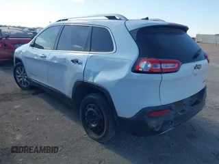 2014 Jeep Cherokee Limited with VIN 1C4PJLDSXEW118473, listed as a IAAI auction lot 41359322 with 111,000 mi miles. Bid and sale history available at carsss.com. Image 3.