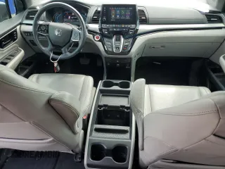 2021 Honda Odyssey Touring z VIN 5FNRL6H85MB039444, wystawiony jako Copart lot #57142205 z przebiegiem 74 228 mil mil oraz Szkoda całkowita • Salvage title. Historia ofert i sprzedaży dostępna na DreamBid. Obrazek 8.