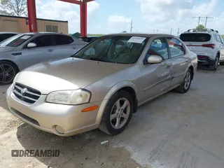 2001 Nissan Maxima GXE z VIN JN1CA31D61T622506, wystawiony jako IAAI lot #42344837 z przebiegiem 128 764 mil mil oraz . Historia ofert i sprzedaży dostępna na DreamBid. Obrazek 2.