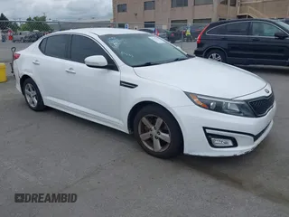 2015 Kia Optima LX with VIN KNAGM4A74F5662579, listed as a IAAI auction lot 42127251 with 144,138 mi miles and . Bid and sale history available at carsss.com. Image 1.