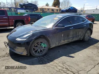 2019 Tesla Model 3 Long Range with VIN 5YJ3E1EB8KF451535, listed as a Copart auction lot 53085105 with 133,928 mi miles and Non Repairable. Bid and sale history available at DreamBid. Image 1.
