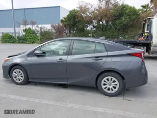 2019 Toyota Prius L Eco with VIN JTDKARFU9K3075219, listed as a IAAI auction lot 42113323 with 218,986 mi miles. Bid and sale history available at carsss.com. Image 14.