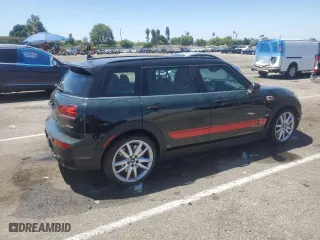 2024 MINI Clubman John Cooper Works with VIN WMWJZ9C0XR2V46300, listed as a Copart auction lot 63060834 with 6,894 mi miles and Salvage Title. Bid and sale history available at carsss.com. Image 3.