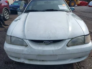 1997 Ford Mustang with VIN 1FALP4040VF200826, listed as a IAAI auction lot 41555969 with 82,134 mi miles. Bid and sale history available at carsss.com. Image 6.