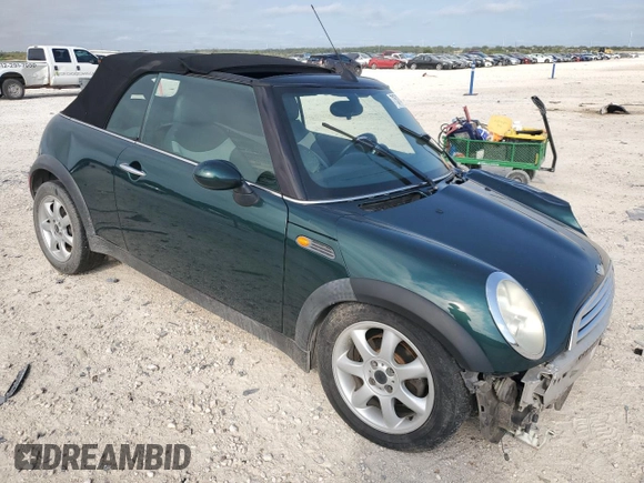 2007 MINI Convertible with VIN WMWRF33567TF66784, listed as a Copart auction lot 71571744 with 115,008 mi miles and Salvage Title. Bid and sale history available at DreamBid. Image 4.