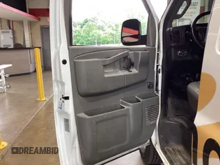 2020 Chevrolet Express Cargo with VIN 1GCWGAFG4L1260657, listed as a IAAI auction lot 42243313 with 116,707 mi miles and . Bid and sale history available at DreamBid. Image 6.