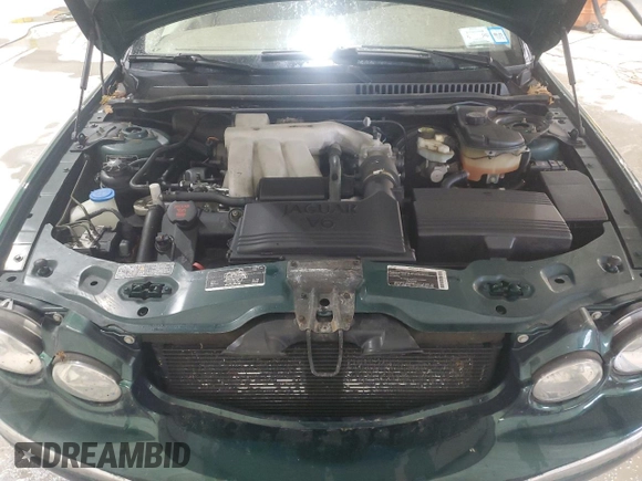 2003 Jaguar X-Type 2.5L Manual z VIN SAJEA51D63XD54591, wystawiony jako Copart lot #57638355 z przebiegiem 93 905 mil mil oraz Szkoda całkowita • Salvage title. Historia ofert i sprzedaży dostępna na DreamBid. Obrazek 11.