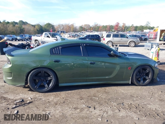 2019 Dodge Charger Scat Pack with VIN 2C3CDXGJ4KH572619, listed as a IAAI auction lot 40973015 with 40,148 mi miles and . Bid and sale history available at DreamBid. Image 13.