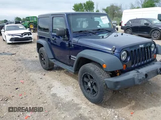 2013 Jeep Wrangler Sport with VIN 1C4AJWAG2DL505655, listed as a IAAI auction lot 42557213 with 185,502 mi miles and . Bid and sale history available at DreamBid. Image 1.