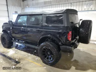 2023 Ford Bronco with VIN 1FMEE5BP5PLA99823, listed as a Copart auction lot 41954945 with 58,938 mi miles and Salvage Title. Bid and sale history available at carsss.com. Image 2.
