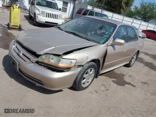 2002 Honda Accord Sdn SE with VIN 1HGCG66812A155003, listed as a IAAI auction lot 41934724 with 192,129 mi miles. Bid and sale history available at carsss.com. Image 2.