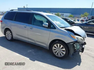 2015 Toyota Sienna XLE with VIN 5TDYK3DC5FS594514, listed as a IAAI auction lot 42183673 with 120,978 mi miles and . Bid and sale history available at DreamBid. Image 1.