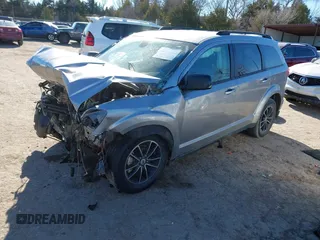 2019 Dodge Journey SE with VIN 3C4PDCBB6KT738488, listed as a IAAI auction lot 41330395 with Not Provided miles and . Bid and sale history available at DreamBid. Image 18.