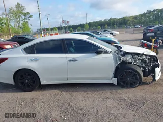 2017 Nissan Altima 2.5 SR with VIN 1N4AL3AP4HC231332, listed as a IAAI auction lot 41966946 with 151,015 mi miles. Bid and sale history available at carsss.com. Image 12.