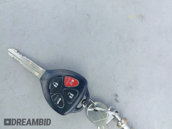 2010 Toyota Corolla with VIN 1NXBU4EEXAZ328590, listed as a IAAI auction lot 41667609 with 60,669 mi miles and . Bid and sale history available at DreamBid. Image 11.