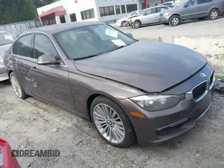 2012 BMW 3 Series 328i with VIN WBA3A5C5XCF349888, listed as a IAAI auction lot 41954810 with 163,070 mi miles. Bid and sale history available at carsss.com. Image 1.