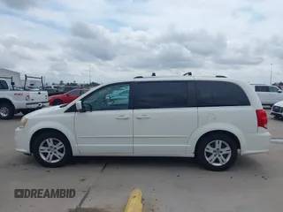 2011 Dodge Grand Caravan Crew with VIN 2D4RN5DGXBR786592, listed as a IAAI auction lot 42114198 with 243,423 mi miles and . Bid and sale history available at DreamBid. Image 14.