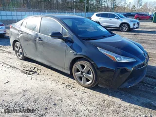2019 Toyota Prius L Eco with VIN JTDKARFU9K3091887, listed as a IAAI auction lot 41282017 with 240,000 mi miles. Bid and sale history available at carsss.com. Image 1.