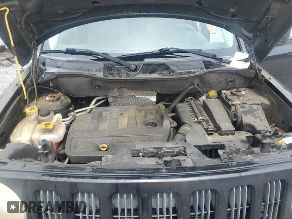 2009 Jeep Patriot Sport z VIN 1J4FT28B39D147223, wystawiony jako Copart lot #53913695 z przebiegiem 132 432 mil mil oraz Szkoda całkowita • Salvage title. Historia ofert i sprzedaży dostępna na DreamBid. Obrazek 12.