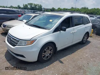 2012 Honda Odyssey EX-L with VIN 5FNRL5H63CB063684, listed as a IAAI auction lot 42576742 with 170,656 mi miles and . Bid and sale history available at DreamBid. Image 17.