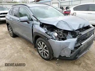 2023 Toyota Corolla Cross XLE with VIN 7MUDAABG1PV052040, listed as a Copart auction lot 51840315 with 43,228 mi miles and Salvage title. Bid and sale history available at DreamBid. Image 12.