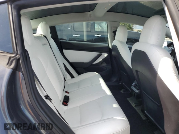 2019 Tesla Model 3 Mid Range with VIN 5YJ3E1EA0KF445185, listed as a Copart auction lot 48630675 with 76,351 mi miles and Salvage Title. Bid and sale history available at carsss.com. Image 10.