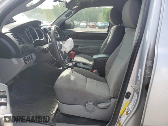 2012 Toyota Tacoma with VIN 5TFLU4ENXCX027960, listed as a Copart auction lot 60689025 with 209,480 mi miles and Salvage title. Bid and sale history available at DreamBid. Image 7.