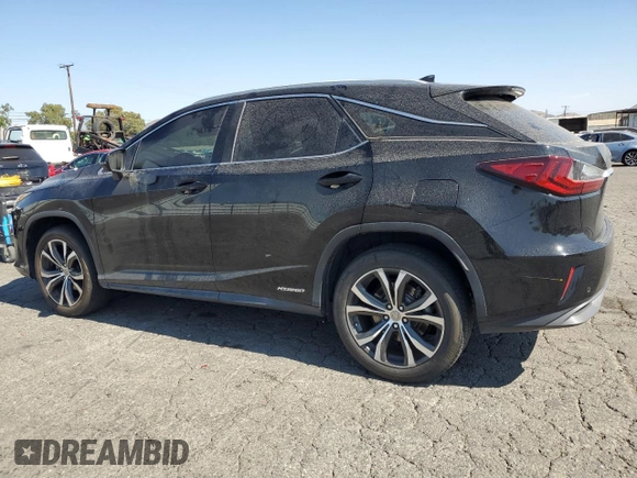 2016 Lexus RX with VIN 2T2ZFMCA2GC001454, listed as a Copart auction lot 65597445 with 214,100 mi miles and Clean title. Bid and sale history available at DreamBid. Image 2.