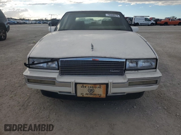 1987 Cadillac Seville z VIN 1G6KS518XHU812739, wystawiony jako Copart lot #79308574 z przebiegiem Nie podano mil oraz Szkoda całkowita • Salvage title. Historia ofert i sprzedaży dostępna na DreamBid. Obrazek 5.