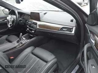 2019 BMW 5 Series 530e iPerformance with VIN WBAJA9C53KB399794, listed as a IAAI auction lot 41561874 with Not Provided miles. Bid and sale history available at carsss.com. Image 5.