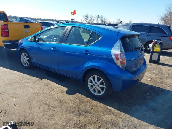 2014 Toyota Prius c One with VIN JTDKDTB30E1574346, listed as a IAAI auction lot 41756182 with 187,631 mi miles. Bid and sale history available at carsss.com. Image 3.