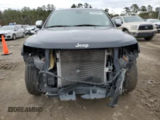 2011 Jeep Grand Cherokee Overland with VIN 1J4RS6GG1BC636963, listed as a Copart auction lot 87654425 with 189,736 mi miles and Salvage Title. Bid and sale history available at DreamBid. Image 5.
