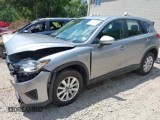 2014 Mazda CX-5 Sport with VIN JM3KE2BEXE0329303, listed as a IAAI auction lot 42556908 with 127,836 mi miles and . Bid and sale history available at DreamBid. Image 17.