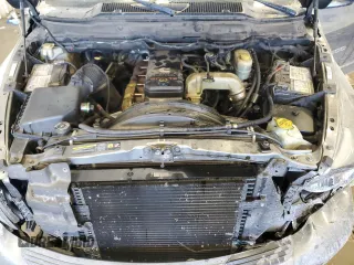 2005 Dodge 2500 ST z VIN 3D7KR28C95G746268, wystawiony jako Copart lot #44561345 z przebiegiem 249 067 mil mil oraz Szkody całkowita. Historia ofert i sprzedaży dostępna na DreamBid. Obrazek 11.