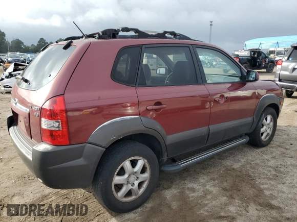 2005 Hyundai Tucson GLS with VIN KM8JN12D05U129525, listed as a Copart auction lot 79690934 with 169,061 mi miles and Salvage Title. Bid and sale history available at carsss.com. Image 3.