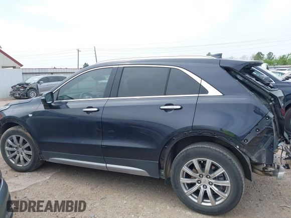 2023 Cadillac XT4 FWD Premium Luxury with VIN 1GYFZCR4XPF101409, listed as a IAAI auction lot 41891293 with 29,355 mi miles and . Bid and sale history available at carsss.com. Image 15.