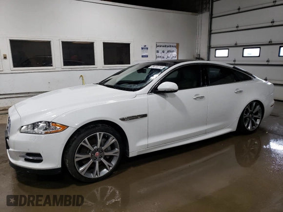2015 Jaguar XJ with VIN SAJWJ1CD3F8V89374, listed as a Copart auction lot 49416114 with 94,636 mi miles and . Bid and sale history available at DreamBid. Image 1.