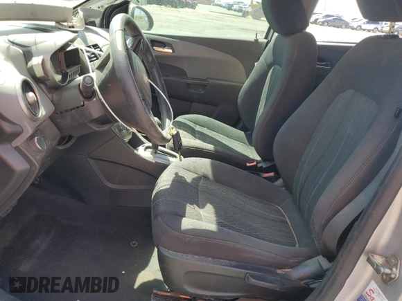 2014 Chevrolet Sonic LT with VIN 1G1JC5SH0E4148279, listed as a Copart auction lot 52308785 with 96,175 mi miles and Salvage Title. Bid and sale history available at DreamBid. Image 7.
